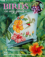 Artist Barbara Baatz Hillman presents a pageant of colorful birds in garden settings: a cardinal, blubebird, chickadee, hummingbird, tanager, bluejay and more! Her special paint finishing techniques, decorative borders and patterns are fun to create and add a crowning touch to pieces like the "Cardinal Tray" and "Tanager Lap Desk" reminicent of old-time crate label and seed packet art.