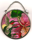 Hibiscus and Hummingbird: Hand-painted glass Sun Catcher.