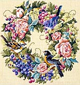 This gorgeous needlepoint design is so rich in color that each little detail stands out; from the vines to the wildlife. The birds look so real, one can almost hear their chirping.
