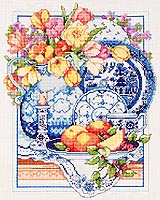 Home cooking and Willowware  Classic china compliment each other! Set a fine table with delicate blue and white china, fruit, flowers and candles on a lace embroidered tablecloth for superb dining. Enjoy dining at its finest with this lovely design.