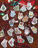A kit of 24 festive holiday ornaments for your Christmas tree. Stockings, trees, toys, etc. Counted Cross Stitch design by Linda Gillum.