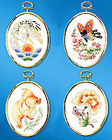 Take a trip to the Orient when you embroider these lovely designs. A butterfly with cherry blossoms, a lovely goldfish, a colorful chrysanthemum and an elegant crane.