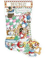 This stocking shows these delightful mice decorating their gingerbread house for the holiday season.