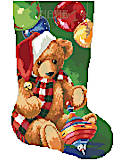 Santa Bear Stocking - PDF: This Christmas teddy bear might be the perfect stocking for a new little kid in your family. Our bold and bright design is unusual in it's big blocks of color, but still detailed and fun to stitch. Complete with an adorable little rainbow spinning top and Christmas orbs, this stocking from Kooler doesn't lack any cuteness!
--